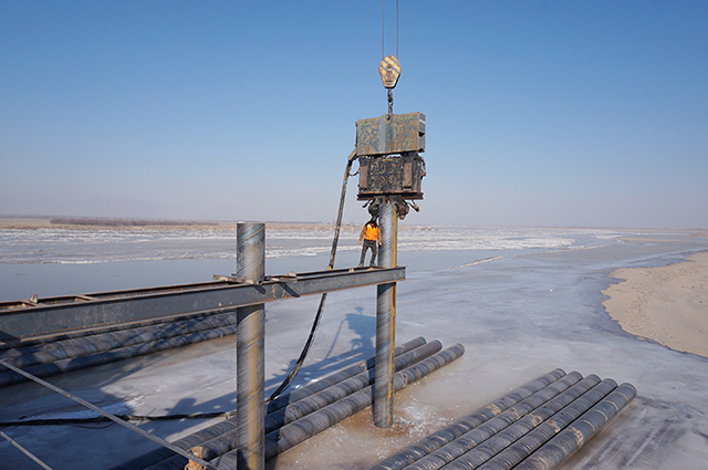 ICE,815C,Yellow River bridge,sandy soil conditions,bore pile