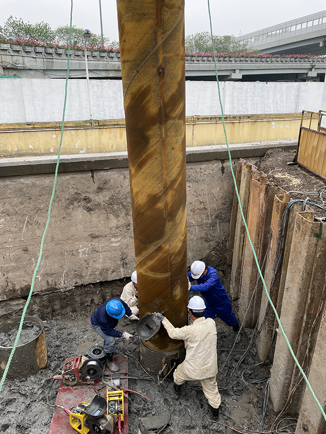 welding steel foundation pile sections together for Shanghai Longyang road elevated highway foundations