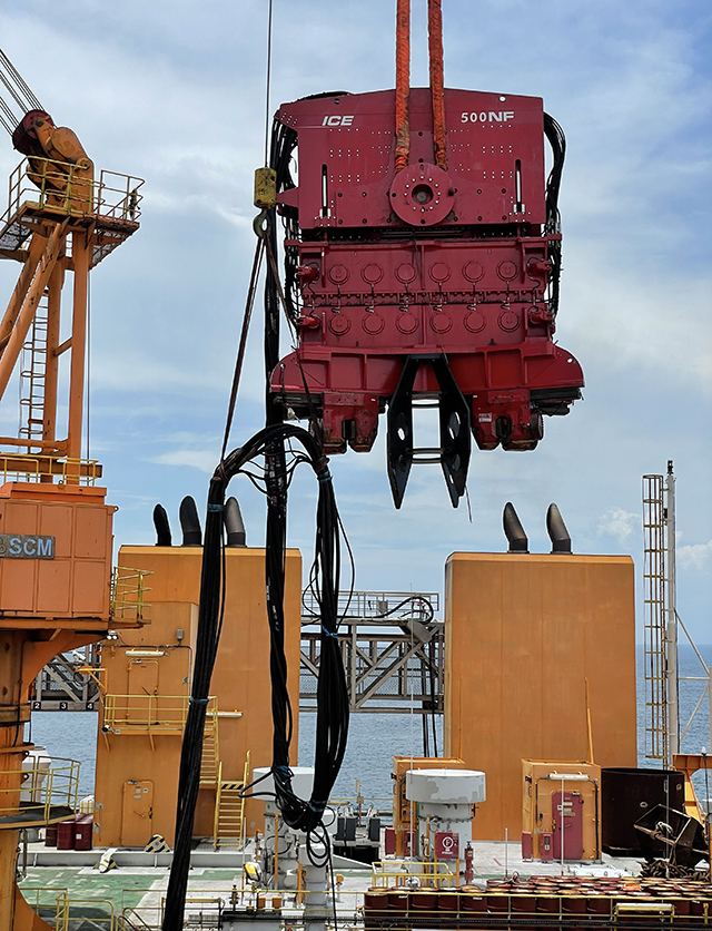 ICE 500NF vibratory hammer preparing for offshore wind turbine foundation installation