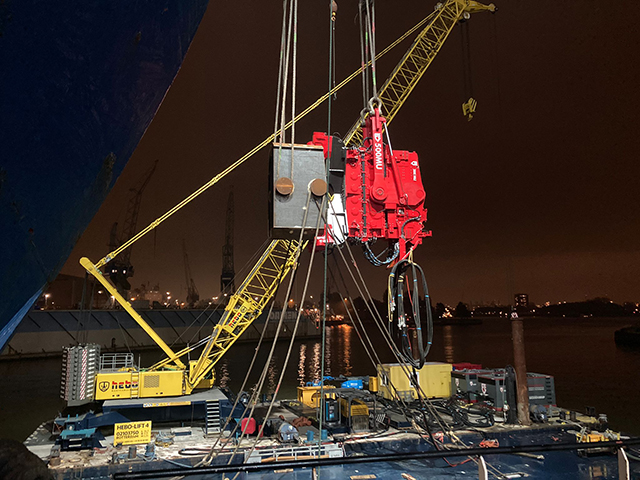 500NFU in up-ending position with night sky of Rotterdam